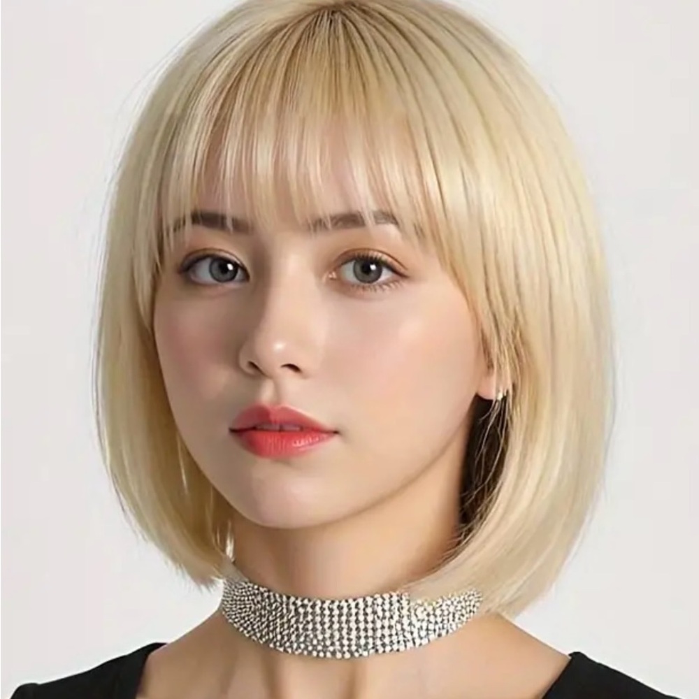 NWT 12” Golden blonde wig. Bob style with bangs